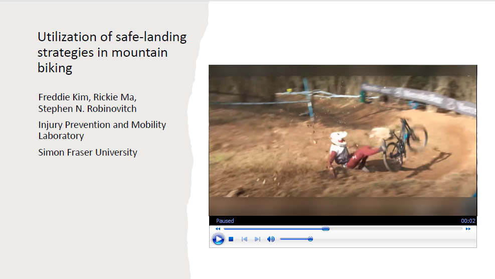 Kim first slide" image of mountain biker falling