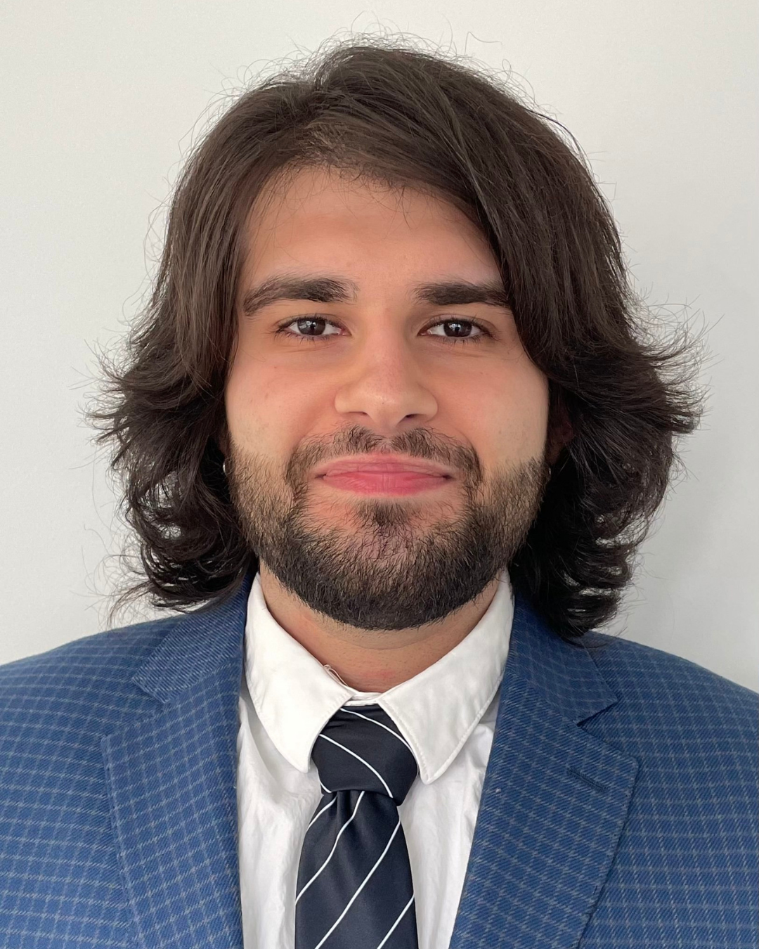 Headshot of the author, Aryan Sharifi.